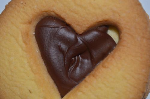 a chocolate doughnut with a heart shaped hole in it at Hotel L'Antico Convitto in Amalfi