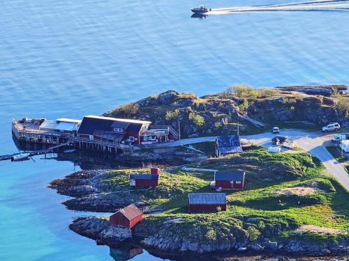 an island in the water with a train on it at 4 person holiday home in Rebbenes in Rebbenes