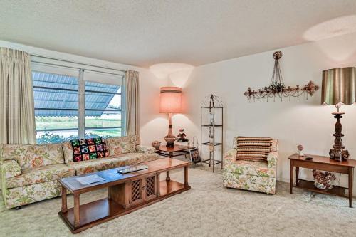 a living room with a couch and a table at Tarpon Lagoon in Port Charlotte
