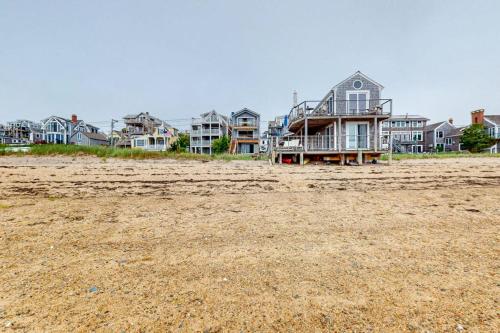 a row of houses on a sandy beach at Bayview Escape in Provincetown