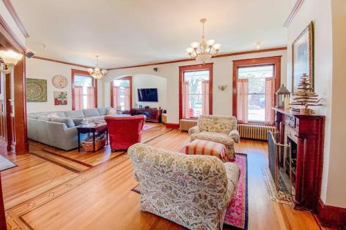 a living room with a couch and a table at The Blacker House in Manistee