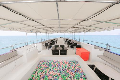 a large tub filled with colorful balls on a boat at Ocean Odyssey in Na Jomtien
