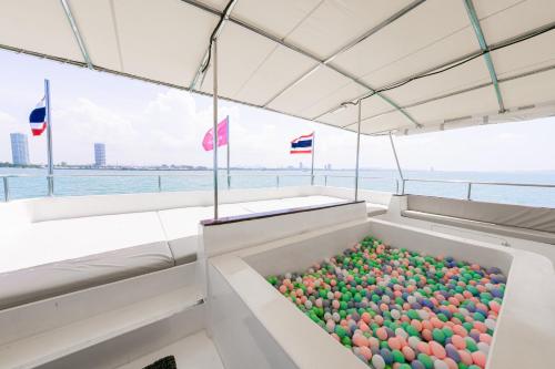 a box filled with balls on a boat at Ocean Odyssey in Na Jomtien