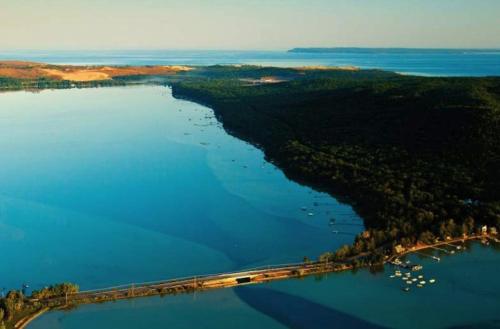 an aerial view of a bridge over a body of water at Trout Lily Cabin in Beulah