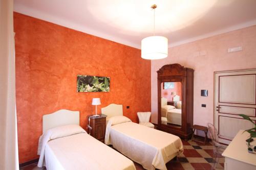 Säng eller sängar i ett rum på Tenute Piazza Countryhouse