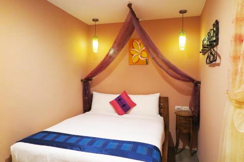 Cama o camas de una habitación en Kenting Sin Sin Hotel
