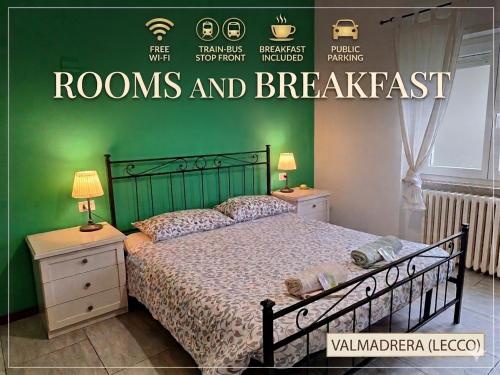 a bedroom with a bed and a green wall at B&B near Lake Como - Close to train & bus - Breakfast included in Valmadrera