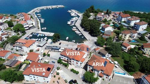 an aerial view of a town with a marina at Boutique Resort Villa VISTA in Malinska
