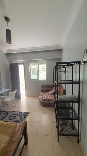 a room with a bed and a bunk bed at Sweet Room in Casa in Casablanca