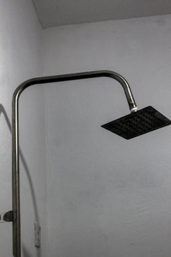 a computer keyboard sitting on top of a lamp at Heavens Gate Ella in Ella