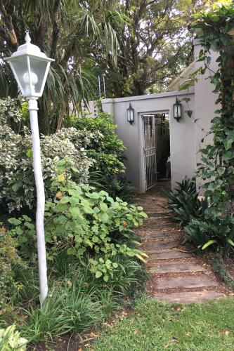 a street light in front of a house at Pollock's B&B in East London