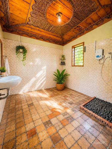 a bathroom with a sink and a toilet at Voyager's Center in Kikorongo