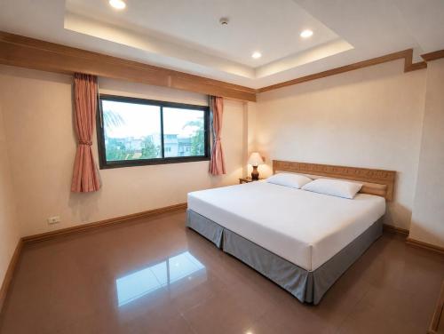 Ліжко або ліжка в номері Karin Hotel