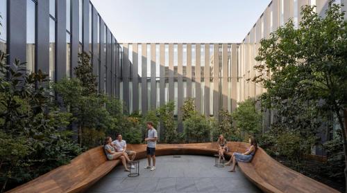 a group of people sitting in front of a building at Episode Tbilisi in Tbilisi City