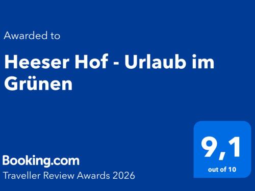 a blue sign with the words herer hot uruubin in grinder at Heeser Hof - Natururlaub direkt am Nationalpark Maasduinen - Natur & Rad & Wanderwege ab Hof - Auszeit auf dem Land - Hunde willkommen in Weeze
