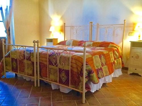 Ένα ή περισσότερα κρεβάτια σε δωμάτιο στο Podere Fornaci