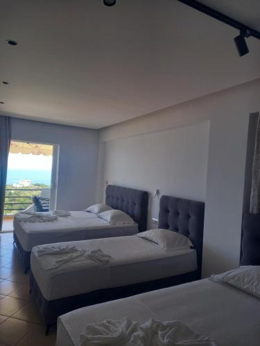 Llit o llits en una habitació de Vila Klaus