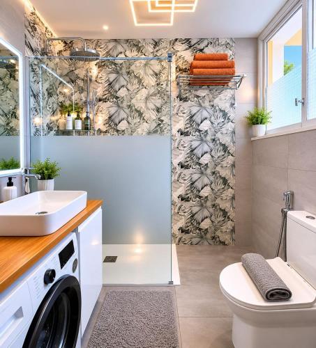 a bathroom with a shower and a washing machine at Veiw Luxury Apartment in Adeje