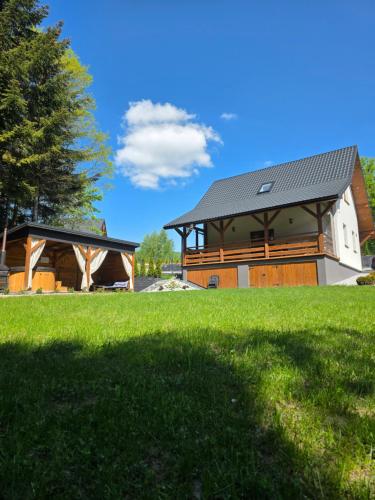 Domek letniskowy Leśne Zacisze- jacuzzi, balia ogrodowa, grill i altana