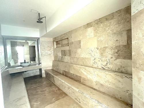 a bathroom with a sink and a mirror at Playa Acapulco Espectacular Apartment in Acapulco