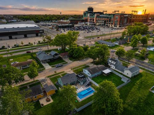 an aerial view of a city with houses at Lambeau View Pool Rooftop Entertainment Room in Green Bay