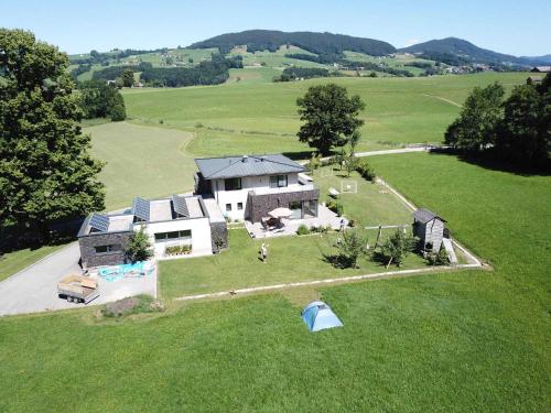 Ferienhaus Gartentraum mit EIGENEM BADEPLATZ am IRRSEE