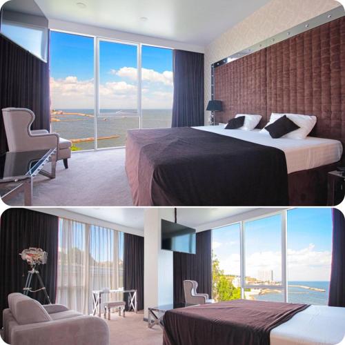 a hotel room with a bed and a large window at Apart Maristella sea view in Odesa