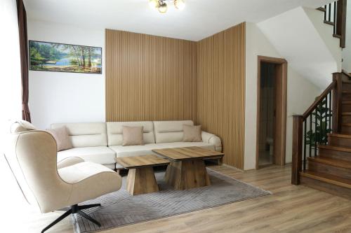 a living room with a couch and a coffee table at Sharr Mount in Prizren