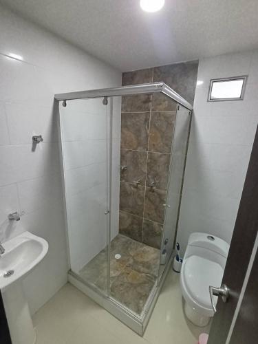 a bathroom with a shower and a toilet at Gran Vista in Fusagasuga
