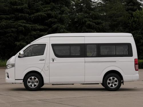 a white van parked in a parking lot at My Car in Pokhara