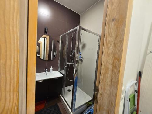 a bathroom with a shower and a sink at Ski & SunDeck in Bjelašnica