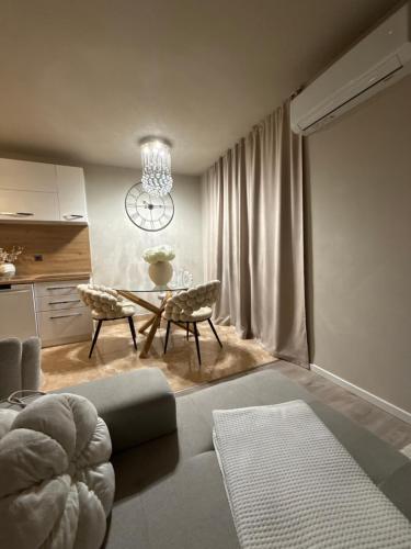 a living room with a couch and a table at Rosabell in Imotski