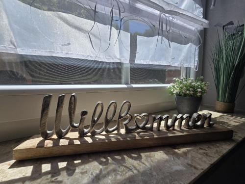 a row of knives on a cutting board next to a window at Haus Blume in Medebach