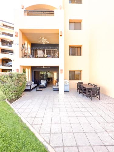 a patio in the middle of a building at Sandy Beach Princesa D101 Ocean Front Resort in Puerto Peñasco