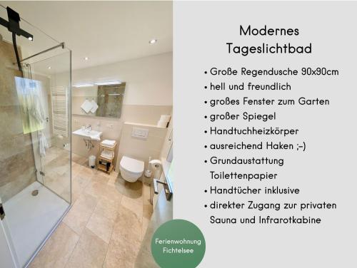 a bathroom with a toilet and a shower at Gästehaus Philipp im Herzen des Fichtelgebirges - 5 Ferienwohnungen, großes Grundstück, Wald und Wiese, Wohnung mit privater Sauna, kostenfreie Parkplätze, WLAN in Mehlmeisel