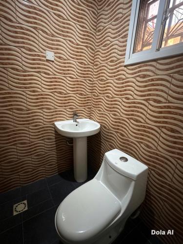 Bilik mandi di Cutting Edge Guest House