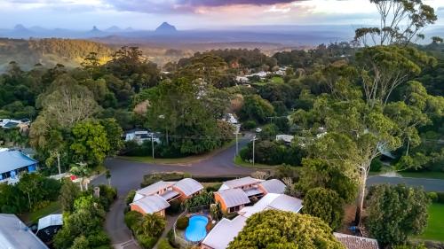 an aerial view of a house in a flooded suburb at Maleny Terrace Cottages in Maleny