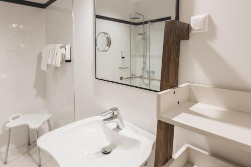 Kylpyhuone majoituspaikassa I´m Inn Wieselburg