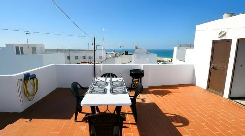Apartamento Cerca del mar azotea privada con Barbacoa Solo alquilo a familias y parejas