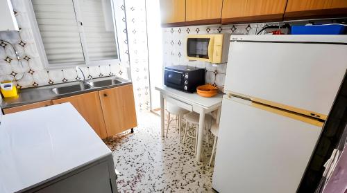 Apartamento Cerca del mar azotea privada con Barbacoa Solo alquilo a familias y parejas