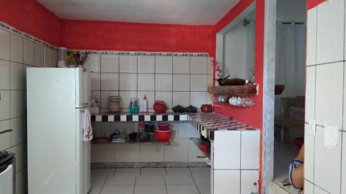 Virtuvė arba virtuvėlė apgyvendinimo įstaigoje Casa Araújo
