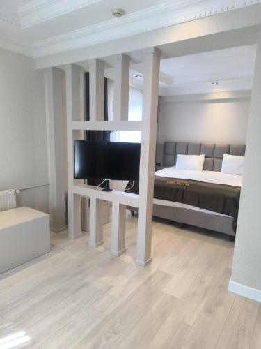 เตียงในห้องที่ ARDOS PARK HOTEL
