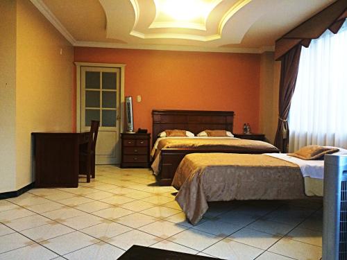Katil atau katil-katil dalam bilik di Gran Hotel Marcjohns