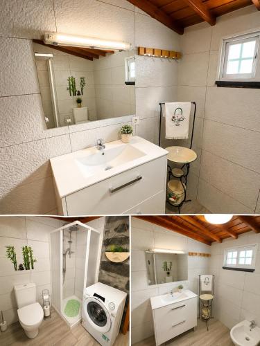 a bathroom with a sink and a toilet and a mirror at Casinha de Pedra in Cais do Pico