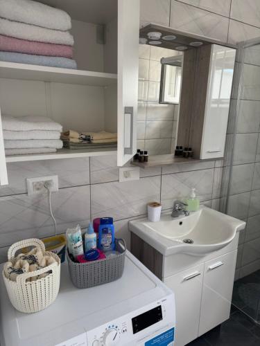 a bathroom with a sink and a mirror at Hubby Resort in Mostar