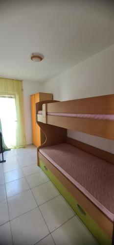 a room with a bunk bed in a room at Emma 2 in Budva