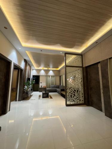a lobby of a building with a lobby at Jhigu in Siliguri