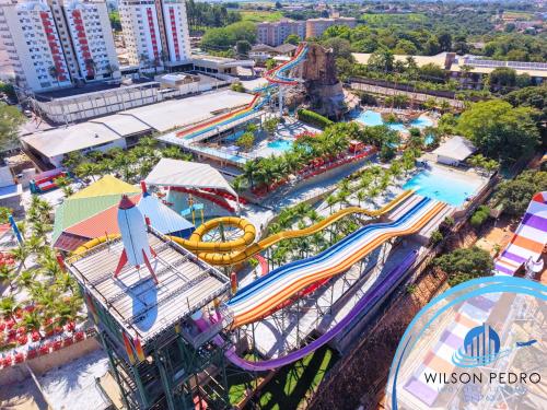 an aerial view of a roller coaster at a water park at Piazza diRoma - Acqua Park e Splash in Caldas Novas