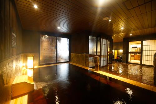 The swimming pool at or close to Dormy Inn Toyama Natural Hot Spring