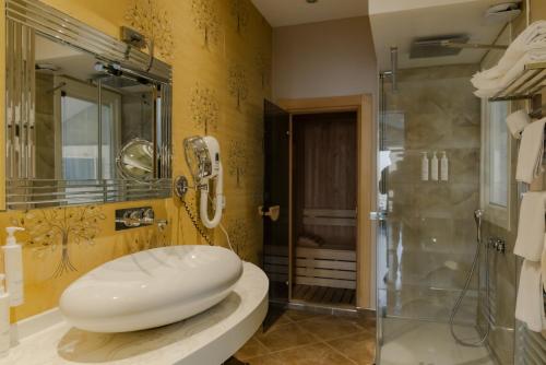 a bathroom with a toilet and a shower at Lale Boutique Hotel in Sapanca